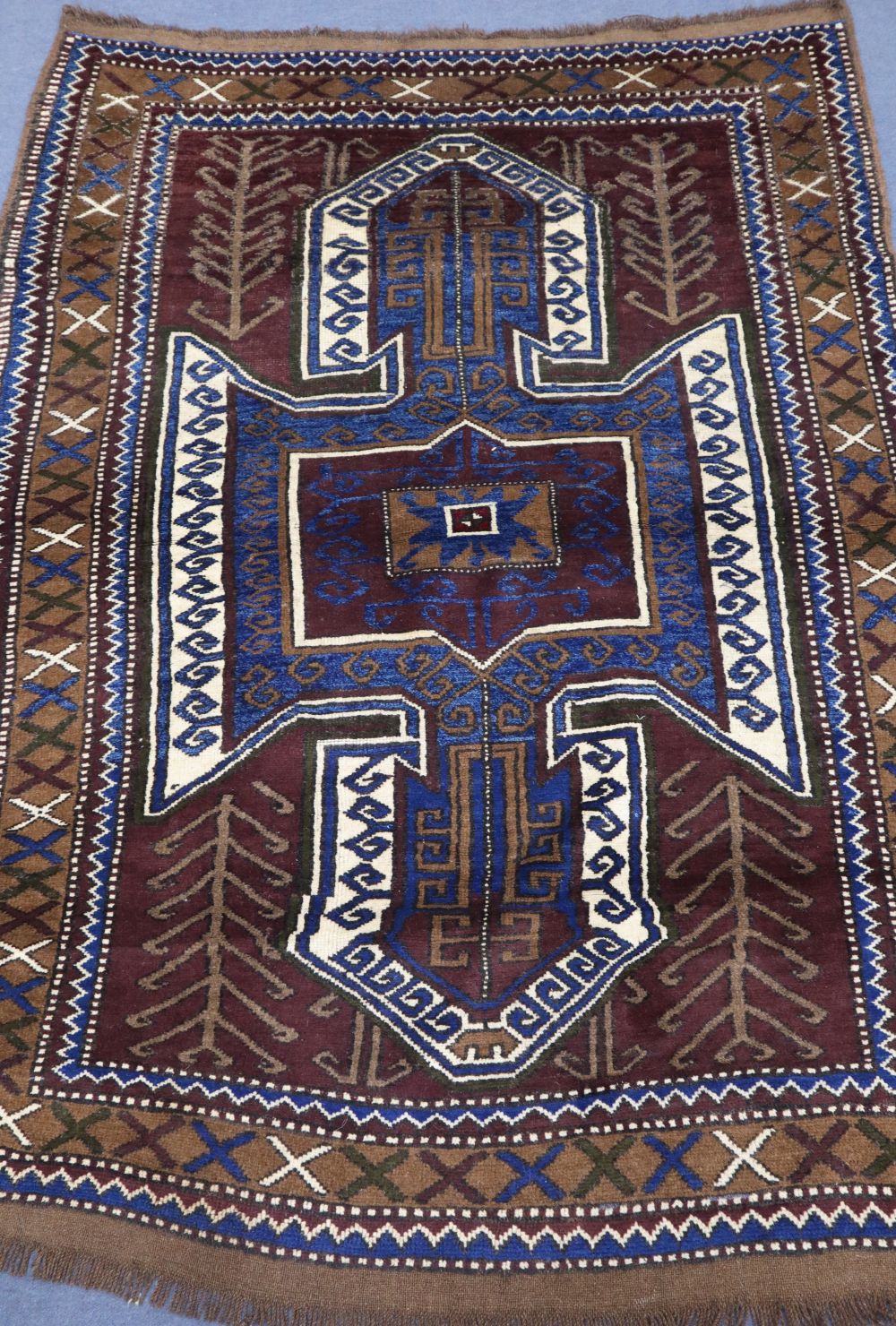 A Turkish rug, 180 x 133cm